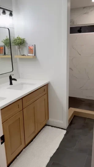 Bathroom vanity and tiled floor